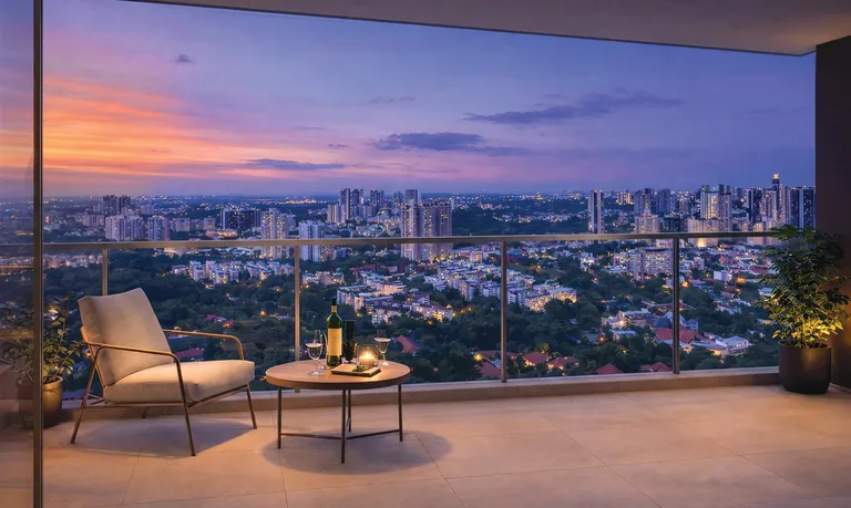Hudson Place Residences, artist&rsquo;s impression: a balcony at dusk with a lounge chair and side table, looking over the trees and low-rise homes to the city lights